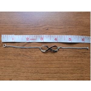 Sterling Silver Infinity Bracelet with Filipino words "ngiti ka lang"